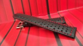 Black perforated leather strap in 18mm , red stitching.